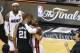 Jun 20, 2013; Miami, FL, USA; Miami Heat shooting guard Dwyane Wade (3) hugs San Antonio Spurs power forward Tim Duncan (21) as LeRon James (6) looks on after game seven in the 2013 NBA Finals at American Airlines Arena. Miami defeated San Antonio 95-88 to win the NBA Championship. Mandatory Credit: Derick E. Hingle-USA TODAY Sports