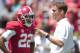Apr 19, 2014; Tuscaloosa, AL, USA; Alabama Crimson Tide offensive coordinator/quarterbacks coach Lane Kiffin talks to wide receiver Christion Jones (22) prior to the A-Day game at Bryant-Denny Stadium. Mandatory Credit: Marvin Gentry-USA TODAY Sports