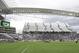 Corinthians's and Botafogo players listen to the national anthem prior to a Brazilian soccer league match at the Itaquerao, the stadium that will host the World Cup opener match between Brazil and Croatia on June 12, in Sao Paulo, Brazil, Sunday, June 1, 2014. (AP Photo/Andre Penner)