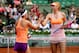 PARIS, FRANCE - MAY 30: Maria Sharapova of Russia shakes hands at the net with Paula Ormaechea of Argentina after their women's singles match on day six of the French Open at Roland Garros on May 30, 2014 in Paris, France. (Photo by Matthew Stockman/Getty Images)