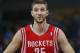 Houston Rockets forward Chandler Parsons looks on against the Denver Nuggets in the third quarter of the Nuggets' 123-116 victory in an NBA basketball game in Denver on Wednesday, April 9, 2014. (AP Photo/David Zalubowski)