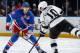 NEW YORK, NY - NOVEMBER 17: Marc Staal #18 of the New York Rangers defends against Mike Richards #10 of the Los Angeles Kings at Madison Square Garden on November 17, 2013 in New York City. The Los Angeles Kings won 1-0. (Photo by Scott Levy/NHLI via Getty Images)