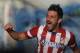 Atletico's David Villa celebrates Diego Godin's goal during a Spanish La Liga soccer match between Getafe and Atletico Madrid at the Coliseum Alfonso Perez stadium in Madrid, Spain, Sunday, April 13, 2014. (AP Photo/Andres Kudacki)