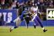 Oct 21, 2013; East Rutherford, NJ, USA; New York Giants defensive back Will Hill (25) dives to tackle Minnesota Vikings running back Adrian Peterson (28) during the first half at MetLife Stadium. Mandatory Credit: Joe Camporeale-USA TODAY Sports