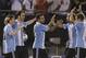 Argentina's Gonzalo Higuain, second left, celebrates scoring against Venezuela with teammates Lionel Messi, left, Ezequiel Lavezzi, center, Pablo Zabaleta, second right, and Walter Montillo during a World Cup 2014 qualifying soccer match in Buenos Aires, Argentina, Friday, March 22, 2013. (AP Photo/Natacha Pisarenko)