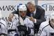 Los Angeles Kings' Marian Gaborik (12) gets instruction from Darryl Sutter in the first period of an NHL hockey game against the Pittsburgh Penguins in Pittsburgh, Thursday, March 27, 2014. The Kings won 3-2. (AP Photo/Gene J. Puskar)
