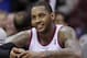 New York Knicks' Carmelo Anthony smiles during the fourth quarter of an NBA basketball game against the Cleveland Cavaliers Saturday, March 8, 2014, in Cleveland. (AP Photo/Tony Dejak)