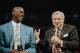 Former Chicago Bulls great Michael Jordan shares a moment with Dean Smith, his former coach at North Carolina during ceremonies honoring Jordan on Tuesday night, Nov. 1, 1994 at Chicago’s United Center. The evening saw Jordan’s number 23 retired and a 12-foot-high bronze statue unveiled outside the stadium. (AP Photo/Pool)