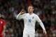 England's Wayne Rooney shouts instructions to a teammate during the international friendly soccer match between England and Peru at Wembley Stadium in London, Friday, May 30, 2014. (AP Photo/Matt Dunham)