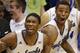 Kansas center Joel Embiid (21), guard Andrew Wiggins, center, and forward Perry Ellis, right, celebrate a basket by teammate Tarik Black during the second half of an NCAA college basketball game in Lawrence, Kan., Saturday, Feb. 22, 2014. Kansas defeated Texas 85-54. (AP Photo/Orlin Wagner)