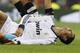 Real Madrid's Cristiano Ronaldo from Portugal reacts after receiving an injury during a Spanish La Liga soccer match against Granada at the Santiago Bernabeu stadium in Madrid, Spain, Sunday, Sept. 2, 2012. (AP Photo/Andres Kudacki)