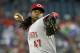 Cincinnati Reds' Johnny Cueto delivers a pitch against the Arizona Diamondbacks during the first inning of a baseball game on Saturday, May 31, 2014, in Phoenix. (AP Photo/Ralph Freso)
