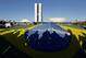 Demonstrators open a Brazil's flag in front of the National Congress during a protest in Brasilia, Brazil, Wednesday, June 26, 2013. The wave of protests that hit Brazil on June 17 began as opposition to transportation fare hikes, then expanded to a list of causes including anger at high taxes, poor services and high World Cup spending, before coalescing around the issue of rampant government corruption. (AP Photo/Eraldo Peres)