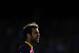 FC Barcelona's Cesc Fabregas looks on during a Spanish La Liga soccer match against Getafe at the Camp Nou stadium in Barcelona, Spain, Saturday May 3, 2014. (AP Photo/Manu Fernandez)