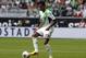 Wolfsburg's Luiz Gustavo plays the ball during the German first division Bundesliga soccer match between VfL Wolfsburg and FC Schalke 04 in Wolfsburg, Germany, Saturday, Aug. 17, 2013. (AP Photo/Michael Sohn)