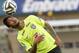 Brazil's Neymar practices during a training session at the Serra Dourada stadium in Goiania, Brazil, Monday, June 2, 2014. Brazil will face Panama on Tuesday in preparation for the World Cup soccer tournament that starts on 12 June. (AP Photo/Andre Penner)