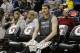Minnesota Timberwolves forward Kevin Love sits on the bench with ice on his knees before an NBA basketball game against the Utah Jazz in Minneapolis, Wednesday, April 16, 2014. (AP Photo/Ann Heisenfelt)