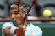 Spain's Rafael Nadal returns the ball to Serbia's Dusan Lajovic during their fourth round match of the French Open tennis tournament at the Roland Garros stadium, in Paris, France, Monday, June 2, 2014. (AP Photo/Darko Vojinovic)