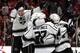 CHICAGO, IL - JUNE 01: Tyler Toffoli #73 of the Los Angeles Kings jumps on Alec Martinez #27 and teammates after Martinez scored the game winning goal against Corey Crawford #50 of the Chicago Blackhawks in overtime 5 to 4 to win Game Seven of the Western Conference Final in the 2014 Stanley Cup Playoffs at United Center on June 1, 2014 in Chicago, Illinois. (Photo by Justin Heiman/Getty Images)