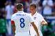 HARRISON, NJ - JUNE 01: Clint Dempsey #8 of the United States is congratulated by teammate Timmy Chandler #21 after Dempsey scored in the second half against Turkey during an international friendly match at Red Bull Arena on June 1, 2014 in Harrison, New Jersey.The United States defeated Turkey 2-1. (Photo by Elsa/Getty Images)