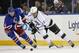 New York Rangers defenseman Anton Stralman (6) of Sweden defends Los Angeles Kings center Anze Kopitar (11) in the second period of their NHL hockey game at Madison Square Garden in New York, Sunday, Nov. 17, 2013. (AP Photo/Kathy Willens)