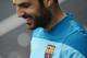 FC Barcelona's Cesc Fabregas smiles during a training session at the Sports Center FC Barcelona Joan Gamper in San Joan Despi, Spain, Saturday, March 22, 2014. Real Madrid will play against FC Barcelona in a Spanish La Liga soccer match next Sunday 23 March. (AP Photo/Manu Fernandez)