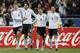 Germany's Sami Khedira, 2nd left, celebrates scoring his side's 2nd goal with teammates Thomas Mueller, Philipp Lahm and Mesut Oezil, from left, during the soccer friendly match between France and Germany in the Stade de France in Saint-Denis, France, Wednesday, Feb.6,2013. (AP Photo/Francois Mori)