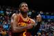 ATLANTA, GA - APRIL 04: Kyrie Irving #2 of the Cleveland Cavaliers grabs his arm after falling out of bounds with the ball against the Atlanta Hawks at Philips Arena on April 4, 2014 in Atlanta, Georgia. NOTE TO USER: User expressly acknowledges and agrees that, by downloading and or using this photograph, User is consenting to the terms and conditions of the Getty Images License Agreement. (Photo by Kevin C. Cox/Getty Images)