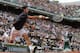 Serbia's Novak Djokovic returns the ball during the quarterfinal match of the French Open tennis tournament against Canada's Milos Raonic at the Roland Garros stadium, in Paris, France, Tuesday, June 3, 2014. (AP Photo/Michel Spingler)