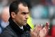 Everton's manager Roberto Martinez looks on ahead of the English Premier League soccer match against Sunderland at the Stadium of Light, Sunderland, England, Saturday, April 12, 2014. (AP Photo/Scott Heppell)