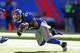 EAST RUTHERFORD, NJ - DECEMBER 30: Stevie Brown #27 of the New York Giants intercepts the ball against the Philadelphia Eagles during their game against the at MetLife Stadium on December 30, 2012 in East Rutherford, New Jersey. (Photo by Al Bello/Getty Images)