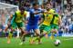 LONDON, ENGLAND - MAY 04: Eden Hazard of Chelsea holds off the challenge of Robert Snodgrass of Norwich City during the Barclays Premier League match between Chelsea and Norwich City at Stamford Bridge on May 4, 2014 in London, England. (Photo by Michael Regan/Getty Images)