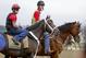 Belmont Stakes hopeful Ride On Curlin, left, pauses before beginning a workout at Belmont Park, Wednesday, June 4, 2014, in Elmont, N.Y. Ride On Curlin will be one of several challengers looking to spoil California Chrome's bid at a Triple Crown when they race in the 146th running of the Belmont Stakes horse race on Saturday. (AP Photo/Garry Jones)
