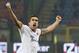 AS Roma midfielder Kevin Strootman, of the Netherlands, celebrates after scoring during the Serie A soccer match between AC Milan and Roma at the San Siro stadium in Milan, Italy, Monday, Dec. 16, 2013. (AP Photo/Antonio Calanni)
