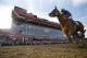 California Chrome, ridden by jockey Victor Espinoza, wins the 139th Preakness Stakes horse race at Pimlico Race Course, Saturday, May 17, 2014, in Baltimore. (AP Photo/Matt Slocum)