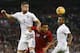 England's Gary Cahill, left, competes for the ball with Peru's Yoshimar Yotun as England's Glen Johnson, right, watches during the international friendly soccer match between England and Peru at Wembley Stadium in London, Friday, May 30, 2014. (AP Photo/Kirsty Wigglesworth)