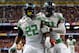 SAN ANTONIO, TX - DECEMBER 30: Linebacker Derrick Malone #22 celebrates a pick six with defensive end Tony Washington #91 of the Oregon Ducks against the Texas Longhorns during the Valero Alamo Bowl at the Alamodome on December 30, 2013 in San Antonio, Texas. (Photo by Ronald Martinez/Getty Images)