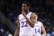 Mar 13, 2014; Kansas City, MO, USA; Kansas Jayhawks guard Andrew Wiggins (22) laughs while on the foul line during the second half against the Oklahoma State Cowboys in the second round of the Big 12 Conference college basketball tournament at Sprint Center. Kansas won 77-70 in overtime. Mandatory Credit: Denny Medley-USA TODAY Sports