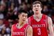 PORTLAND, OR - NOVEMBER 16: Jeremy Lin #7 and Omer Asik #3 of the Houston Rockets wait to resume action against the Portland Trail Blazers on November 16, 2012 at the Rose Garden Arena in Portland, Oregon. NOTE TO USER: User expressly acknowledges and agrees that, by downloading and or using this photograph, user is consenting to the terms and conditions of the Getty Images License Agreement. Mandatory Copyright Notice: Copyright 2012 NBAE (Photo by Sam Forencich/NBAE via Getty Images)