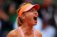 PARIS, FRANCE - JUNE 03: Maria Sharapova of Russia celebrates a point during her women's singles match against Garbine Muguruza of Spain on day ten of the French Open at Roland Garros on June 3, 2014 in Paris, France. (Photo by Clive Brunskill/Getty Images)
