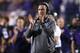 Northwestern head coach Pat Fitzgerald applauds his team during the first half of an NCAA football game against Ohio State, Saturday, Oct. 5, 2013, in Evanston, Ill. (AP Photo/Charles Rex Arbogast)