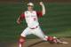 FILE - In this June 20, 2013 file photo, North Carolina State pitcher Carlos Rodon throws against North Carolina during an NCAA College World Series elimination baseball game in Omaha, Neb. (AP Photo/Nati Harnik, File)