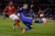 Argentina's Rodrigo Palacio, right, vies for the ball with Trinidad and Tobago's Sheldon Bateau during their international friendly soccer match in Buenos Aires, Argentina, Wednesday, June 4, 2014. (AP Photo/Natacha Pisarenko)