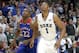 Duke forward Jabari Parker and Kansas guard Andrew Wiggins look for a possible rebound off a free-throw attempt during the second half of an NCAA college basketball game Tuesday, Nov. 12, 2013, in Chicago. Kansas won 94-83. (AP Photo/Charles Rex Arbogast)