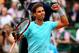 PARIS, FRANCE - JUNE 02: Rafael Nadal of Spain celebrates victory in his men's singles match against Dusan Lajovic of Serbia on day nine of the French Open at Roland Garros on June 2, 2014 in Paris, France. (Photo by Clive Brunskill/Getty Images)