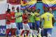 Players argue after England's Raheem Sterling, far left, was called on a sliding challenge on Ecuador winger Antonio Valencia in the second half of a friendly soccer match in Miami Gardens, Fla., Wednesday, June 4, 2014. The game ended in a 2-2 tie. (AP Photo/Alan Diaz)