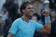Spain's Rafael Nadal celebrates winning the quarterfinal match of the French Open tennis tournament against compatriot David Ferrer at the Roland Garros stadium, in Paris, France, Wednesday, June 4, 2014. Nadal won in four sets 4-6, 6-4, 6-0, 6-1. (AP Photo/Michel Euler)