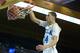 LOS ANGELES, CA - DECEMBER 14: Zach LaVine #14 of the UCLA Bruins dunks in front of Wanaah Bail #1 during a 95-71 win over the Prairie View A&M Panthers at Pauley Pavilion on December 14, 2013 in Los Angeles, California. (Photo by Harry How/Getty Images)