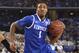 Apr 5, 2014; Arlington, TX, USA; Kentucky Wildcats guard/forward James Young (1) drives past Wisconsin Badgers guard Traevon Jackson (12) int he first half during the semifinals of the Final Four in the 2014 NCAA Mens Division I Championship tournament at AT&T Stadium. Mandatory Credit: Bob Donnan-USA TODAY Sports