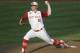FILE - In this June 20, 2013 file photo, North Carolina State pitcher Carlos Rodon throws against North Carolina during an NCAA College World Series elimination baseball game in Omaha, Neb. The Houston Astros are on the clock to lead off the Major League Baseball draft for the third straight year Thursday night June 5, 2014. Houston has a few options with the first pick, including a pair of California high school stars in left-hander Brady Aiken and catcher-outfielder Alex Jackson, and North Carolina State lefty Carlos Rodon. (AP Photo/Nati Harnik, File)